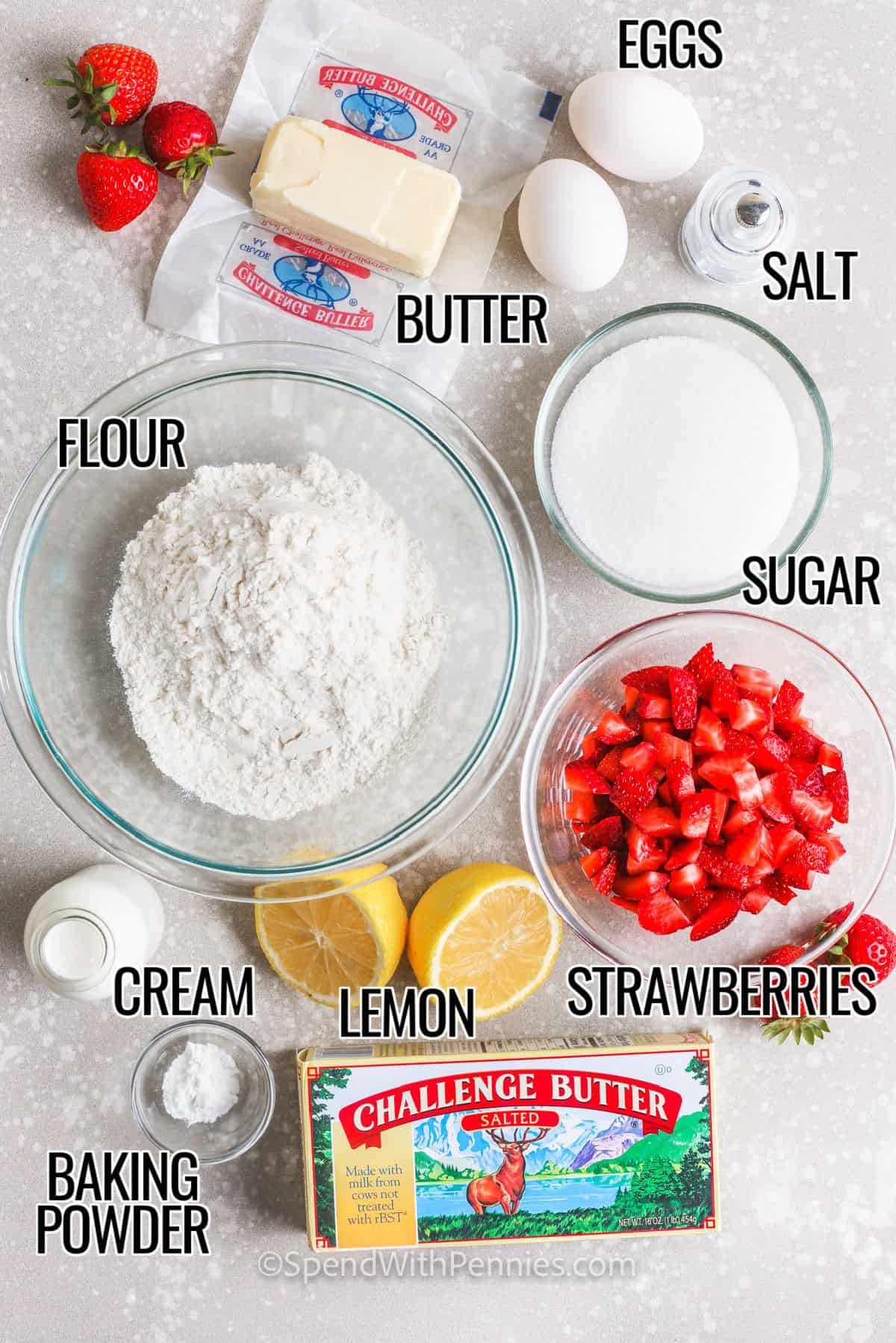 strawberries , lemon , cream , baking powder , sugar , flour , butter , salt and eggs to make Strawberry Bread with labels